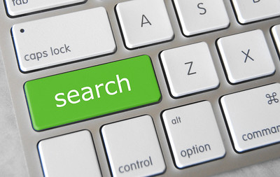 Illustration of a keyboard with a green search key