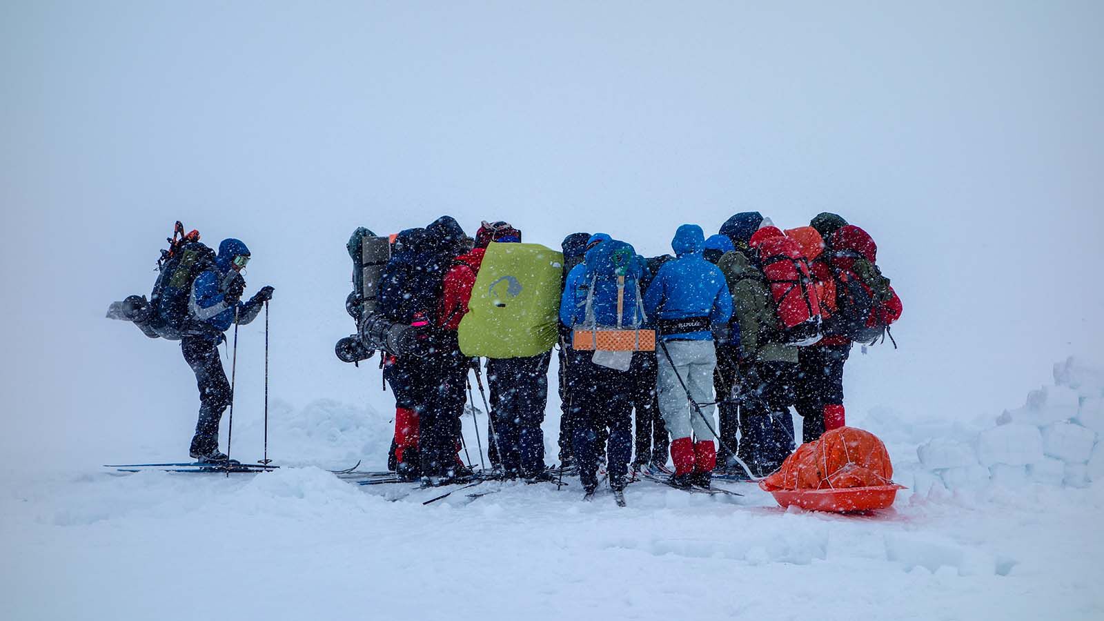 Students on a trip in a winter snowstorm.