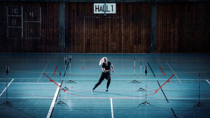 Research participant runs through a series of sensors tracking movement