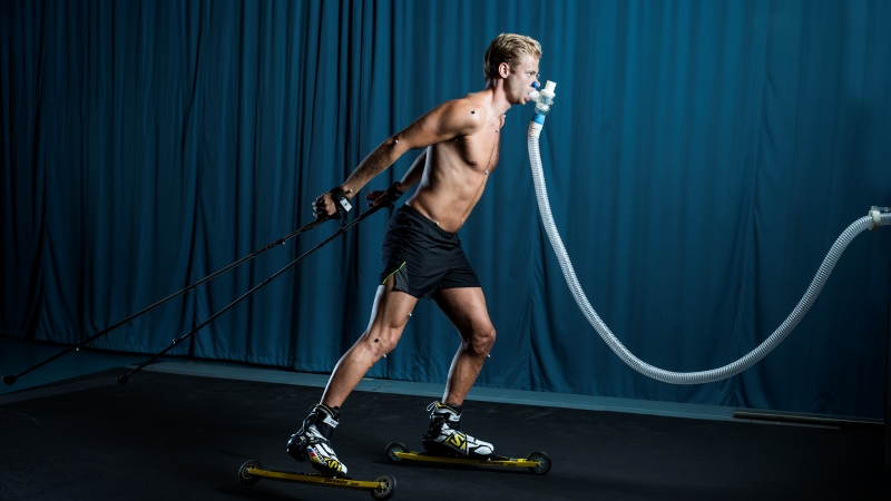 Man on treadmill with roller skis