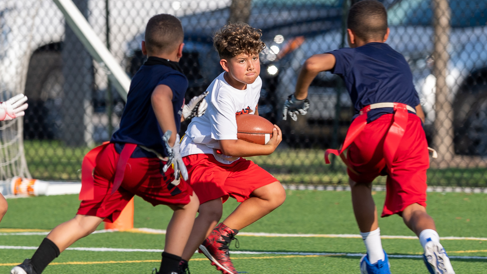 Kids playing american football