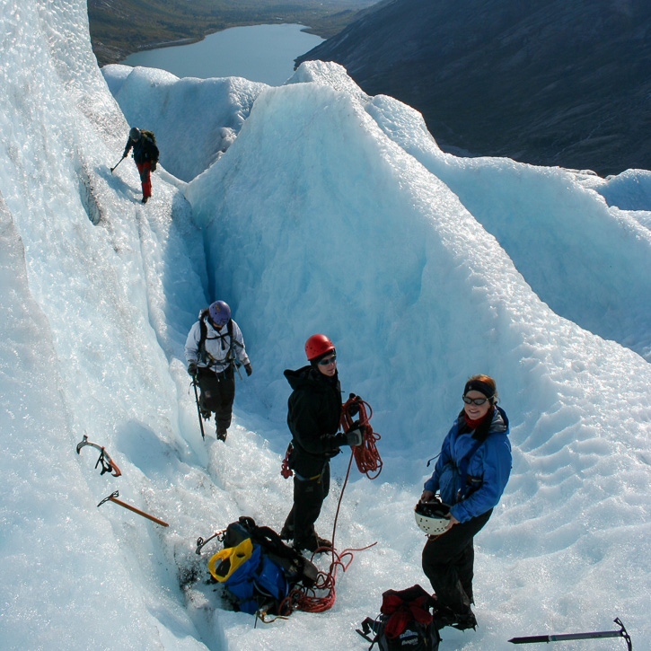 Students and hiking equipment in a small ravine up on the glacier